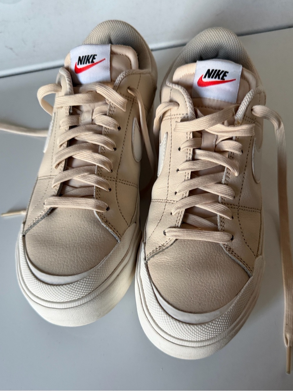 Nike Women’s Cream Low-Top Leather Sneakers with White Logo
